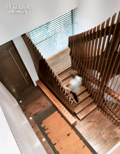 395361-Walnut_fins_rotated_at_varying_angles_define_the_staircase_Photo_by_Ben_Rahn_A_Frame_